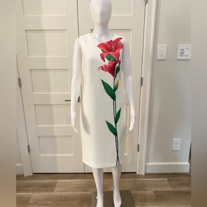 White Calvin Klein Floral Sheath Dress
Back zip
Size 8